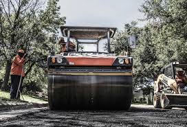 Best Asphalt Driveway Installation  in Brightwaters, NY